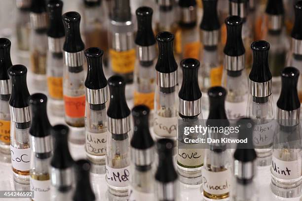 Different flavours for E-Cigarettes are sold at the V-Revolution E-Cigarette shop in Covent Garden on August 27, 2014 in London, England. The...