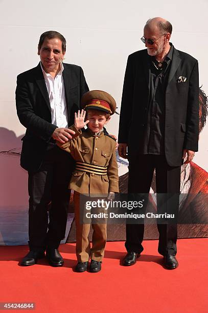 Director Mohsen Makhmalbaf with actors Dachi Orvelashvili and Misha Gomiashvili attend the 'The President' premiere during the 71st Venice Film...