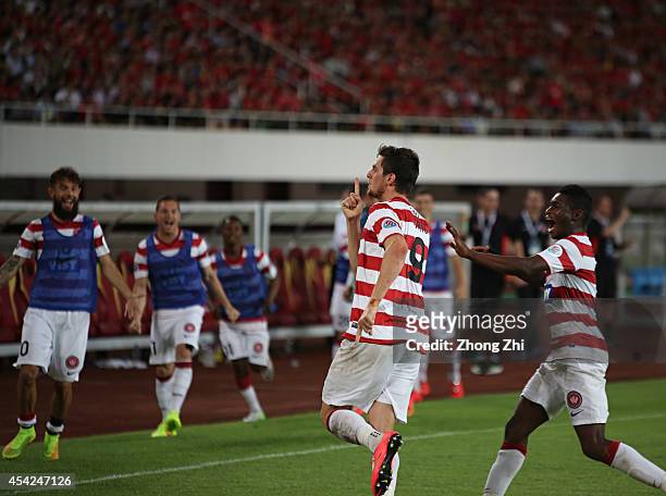Tomi Juric of Western Sydney Wanderers celebrates with team-mates after scoring a goal during the Asian Champions League Quarter Final match between...