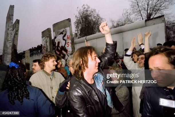 East Berliners crowd in front of the Berlin Wall on November 12, 1989 at the Potsdamer Square. Three days before, Gunter Schabowski, the East Berlin...