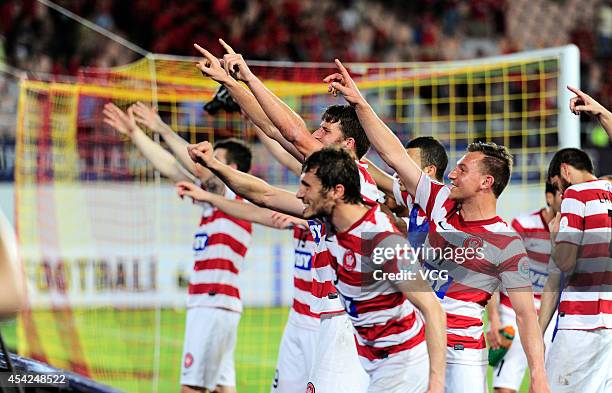 Western Sydney Wanderers players celebrate after the Asian Champions League quarter-final match between Guangzhou Evergrande and Western Sydney...