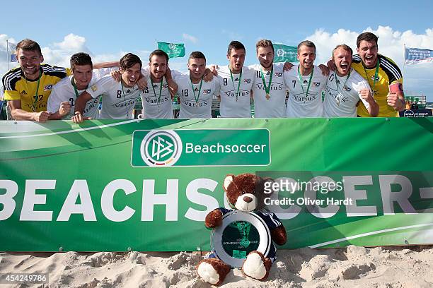 Players of Chemnitz celebrates after the final match between BST Chemnitz and Rostocker Robben one day two of the DFB Beachscoccer Cup at the beach...