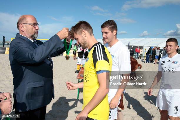 Players of Chemnitz celebrates after the final match between BST Chemnitz and Rostocker Robben one day two of the DFB Beachscoccer Cup at the beach...