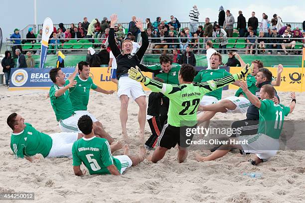 Players of Beach Pirates celebrate after the match between Beach Kick Berlin and GWS Beach Pirates on day two of the DFB Beachscoccer Cup at the...