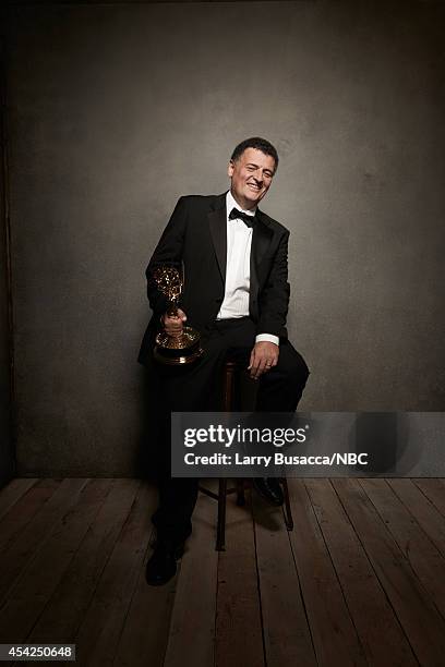 66th ANNUAL PRIMETIME EMMY AWARDS -- Pictured: Sherlock writer Steven Moffat poses in the NBC/People photo booth during the 66th Annual Primetime...