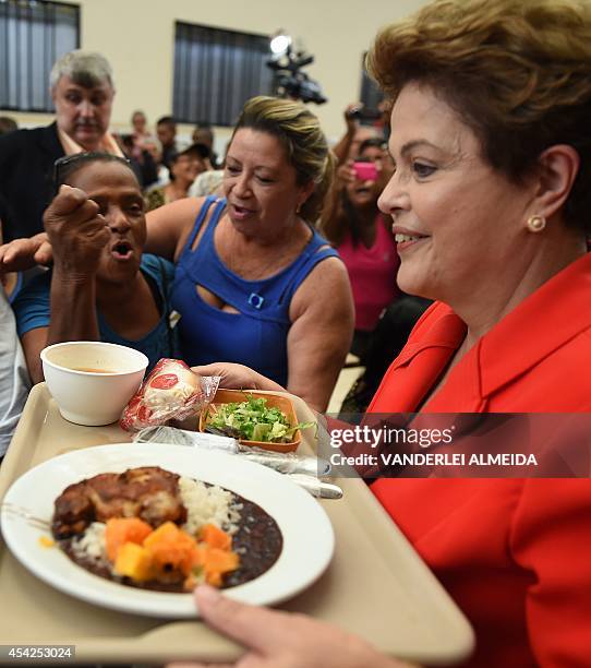 Presidential candidate for the Brazilian Workers' Party and current Brazilian President Dilma Rousseff , has lunch at a the "Presidente Getulio...