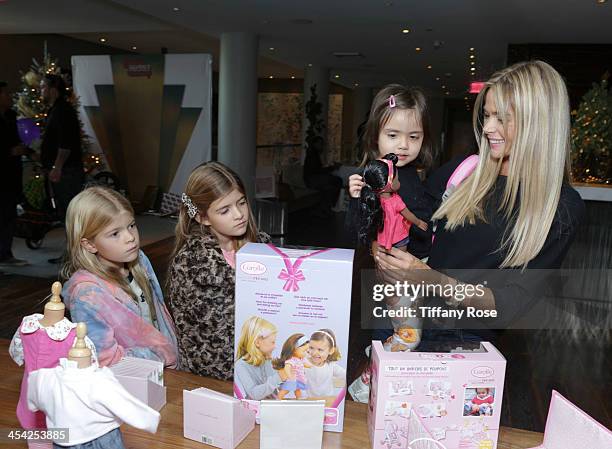 Denise Richards, Eloise Richards, Lola Sheen and Sam Sheen attend the 3rd Annual Santa's Secret Workshop Benefiting LA Family Housing at Andaz Hotel...