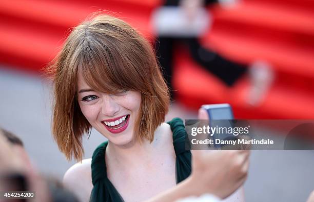 Emma Stone attends the Opening Ceremony and 'Birdman' premiere during the 71st Venice Film Festival on August 27, 2014 in Venice, Italy