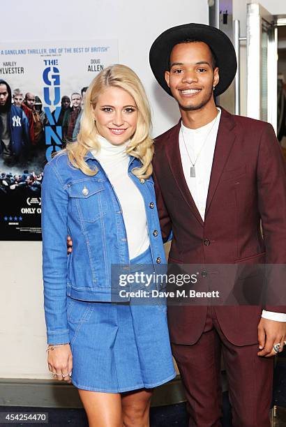 Pixie Lott and Harley "Sylvester" Alexander-Sule attend the UK Premiere of "The Guvnors" at Odeon Covent Garden on August 27, 2014 in London, England.