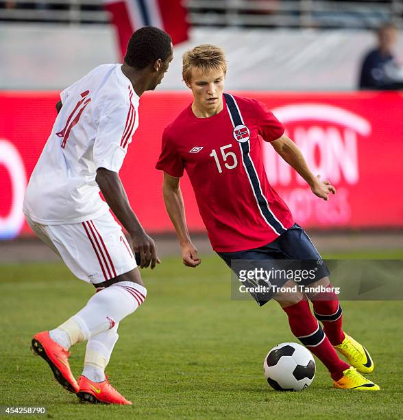 Martin Odegaard of Norway and A.Khalil of United Arab Emirates during the International Friendly match between Norway and the United Arab Emirates at...