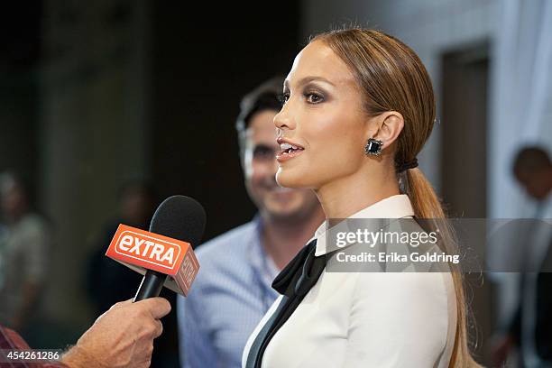 Jennifer Lopez is interviewed by press as she arrives at the Ernest N. Morial Convention Center on August 27, 2014 in New Orleans, Louisiana.