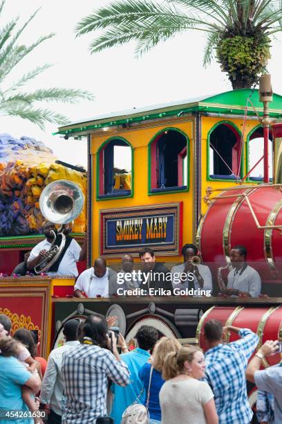 Harry Connick, Jr. And True Orleans Brass Band arrive at the Ernest N. Morial Convention Center on a Mardi Gras float on August 27, 2014 in New...