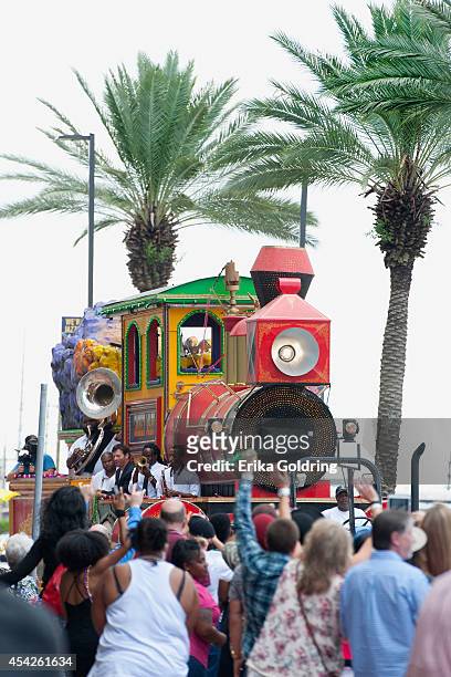 Harry Connick, Jr. And True Orleans Brass Band arrive at the Ernest N. Morial Convention Center on a Mardi Gras float on August 27, 2014 in New...
