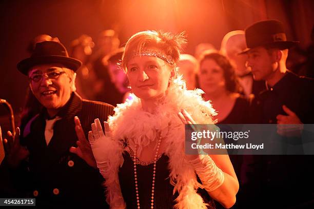 Chaps and Chapettes" practice the steps to a dance at the Fifth Grand Anarcho-Dandyist Ball at the Bloomsbury Ballroom on December 7, 2013 in London,...