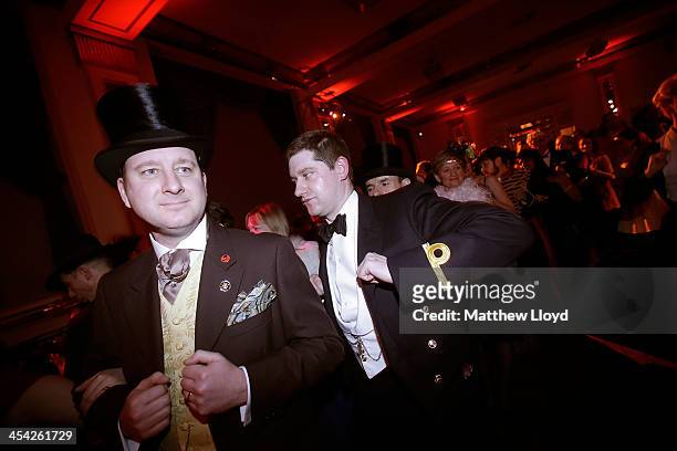 Chaps and Chapettes" enjoy the Fifth Grand Anarcho-Dandyist Ball at the Bloomsbury Ballroom on December 7, 2013 in London, England. The Ball is a...