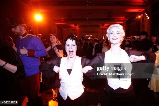 Chaps and Chapettes" practice the steps to a dance at the Fifth Grand Anarcho-Dandyist Ball at the Bloomsbury Ballroom on December 7, 2013 in London,...