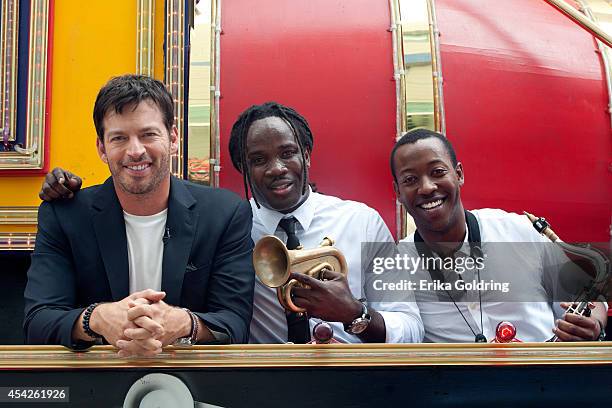 Harry Connick, Jr. And Shamarr Allen and Calvin Johnson of True Orleans Brass Band arrive at the Ernest N. Morial Convention Center on a Mardi Gras...