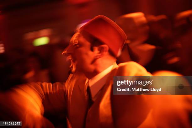 Chaps and Chapettes" practice the steps to a dance at the Fifth Grand Anarcho-Dandyist Ball at the Bloomsbury Ballroom on December 7, 2013 in London,...