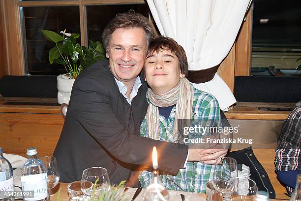 Timothy Peach and son attend the Dorfstadl Evening - Tirol Cross Mountain 2013 on December 07, 2013 in Innsbruck, Austria.