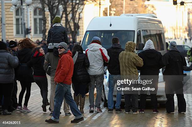 Activists protesting against government and police corruption block police vehicles from passing on December 5, 2013 in Sofia, Bulgaria. Restrictions...