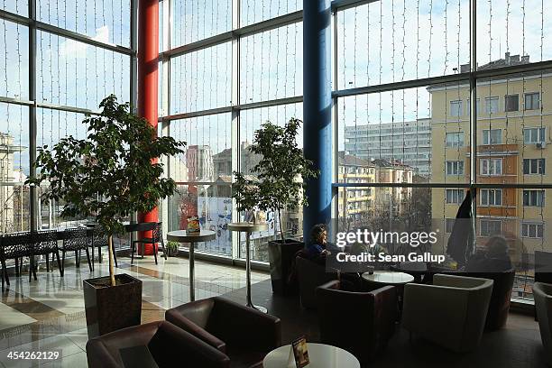 Shoppers relax with coffee in the Mall of Sofia shopping mall on December 8, 2013 in Sofia, Bulgaria. Restrictions on the freedom of Bulgarians and...