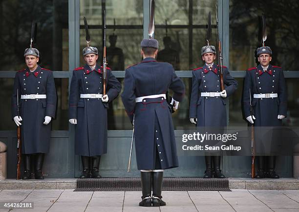 Ceremonial guards rotate their shift at the Presidential Palace December 7, 2013 in Sofia, Bulgaria. Restrictions on the freedom of Bulgarians and...