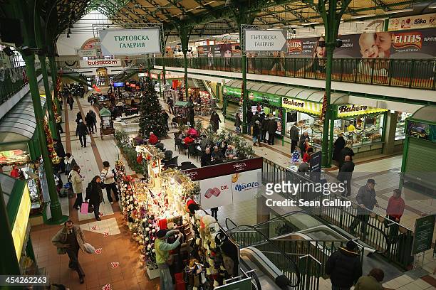 Shoppers crowd the Central Hall covered market on December 7, 2013 in Sofia, Bulgaria. Restrictions on the freedom of Bulgarians and Romanians to...