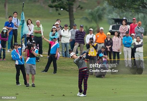 So Yeon Ryu of South Korea, chips from the fairway onto the eighteenth green, during the last day of the Swinging Skirts 2013 World Ladies Masters,...