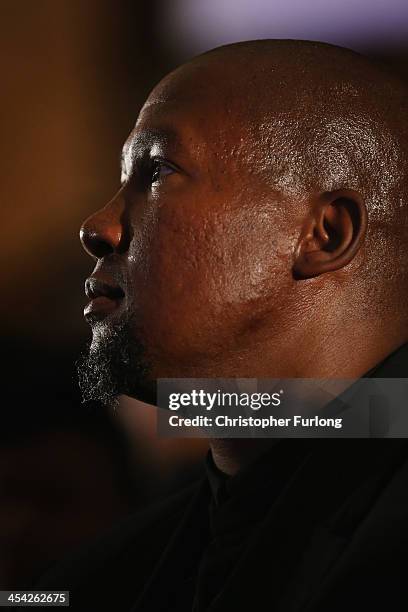 Mandla Mandela the grandson of Nelson Mandela attends a service at Bryanston Methodist Church during a national day of prayer, on December 8, 2013 in...