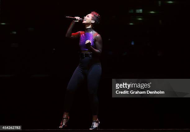 Alicia Keys performs live for fans at Rod Laver Arena on December 8, 2013 in Melbourne, Australia.