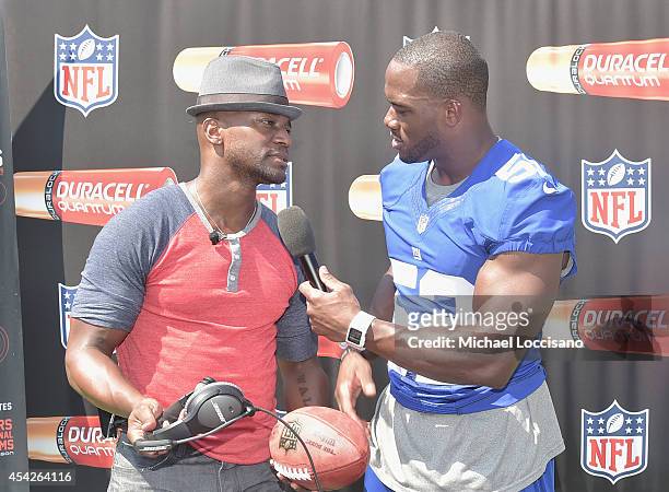 Actor Taye Diggs and professional football player Jon Beason attend an interactive tour of MetLife Stadium on August 27, 2014 in East Rutherford, New...