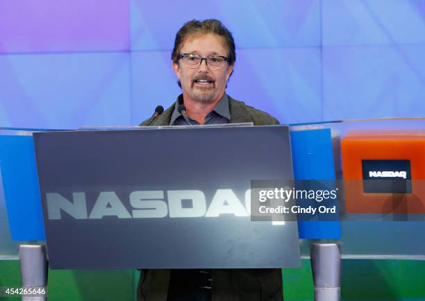 Cosmos: A SpaceTime Odyssey co-executive producer Jason Clark rings the closing bell at the NASDAQ MarketSite on August 27, 2014 in New York City.