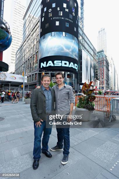 Cosmos: A SpaceTime Odyssey co-executive producer Jason Clark poses for a photo with Cosmos: A SpaceTime Odyssey associate producer Joseph J. Micucci...