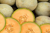 A group shoot of sliced cantaloupe melons
