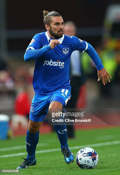 Ricky Holmes of Portsmouth in action during the Capital One Cup Second Round match between Stoke City and Portsmouth at Britannia Stadium on August...