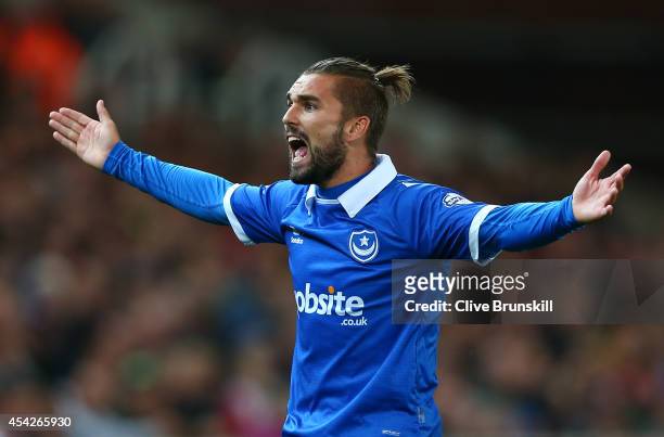 Ricky Holmes of Portsmouth in action during the Capital One Cup Second Round match between Stoke City and Portsmouth at Britannia Stadium on August...