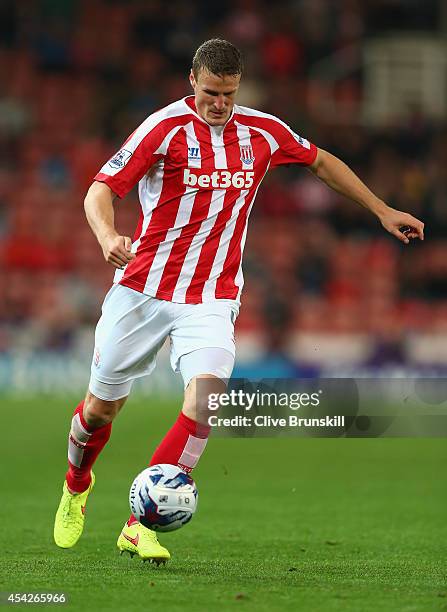 Robert Huth of Stoke City in action during the Capital One Cup Second Round match between Stoke City and Portsmouth at Britannia Stadium on August...