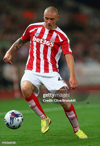 Andy Wilkinson of Stoke City in action during the Capital One Cup Second Round match between Stoke City and Portsmouth at Britannia Stadium on August...