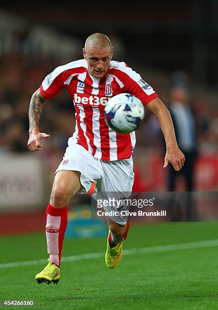 Andy Wilkinson of Stoke City in action during the Capital One Cup Second Round match between Stoke City and Portsmouth at Britannia Stadium on August...