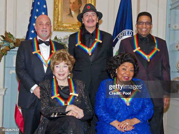 Billy Joel, Shirley MacLaine, Carlos Santana, Martina Arroyo and Herbie Hancock attend the formal Artist's Dinner honoring the recipients of the 2013...