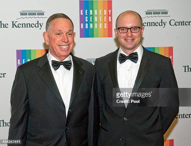 Michael Kaiser and John Roberts arrive for the formal Artist's Dinner honoring the recipients of the 2013 Kennedy Center Honors hosted by United...