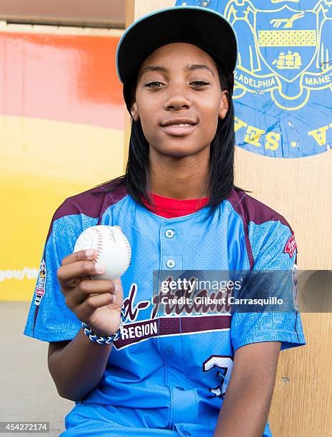 Pitcher Mo'ne Davis of Philadelphia Little League Baseball team Taney Dragons attends a parade celebrating the team's championship on August 27, 2014...