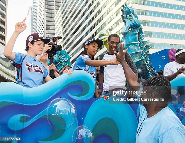 Pitcher Mo'ne Davis of Philadelphia Little League baseball team Taney Dragons attends a parade celebrating the team's championship on August 27, 2014...