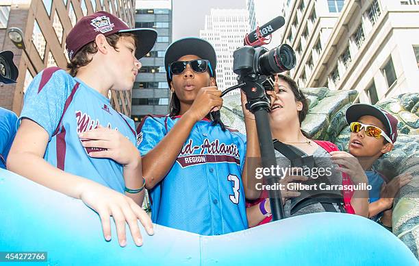 Pitcher Mo'ne Davis of Philadelphia Little League baseball team Taney Dragons attends a parade celebrating the team's championship on August 27, 2014...