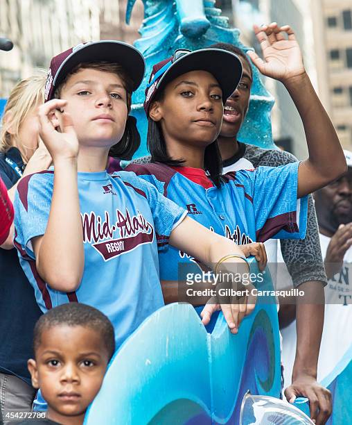 Pitcher Mo'ne Davis of Philadelphia Little League baseball team Taney Dragons attends a parade celebrating the team's championship on August 27, 2014...