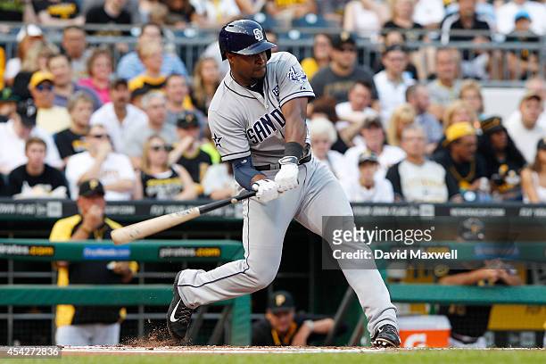 Chris Nelson of the San Diego Padres bats against the Pittsburgh Pirates during the first inning of their game on August 9, 2014 at PNC Park in...