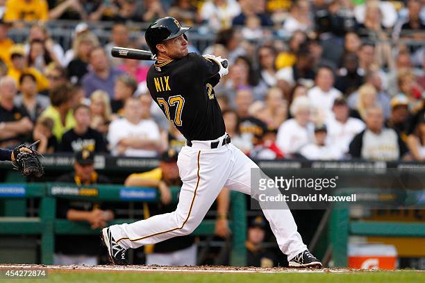 Jayson Nix of the Pittsburgh Pirates bats against the San Diego Padres during the second inning of their game on August 9, 2014 at PNC Park in...