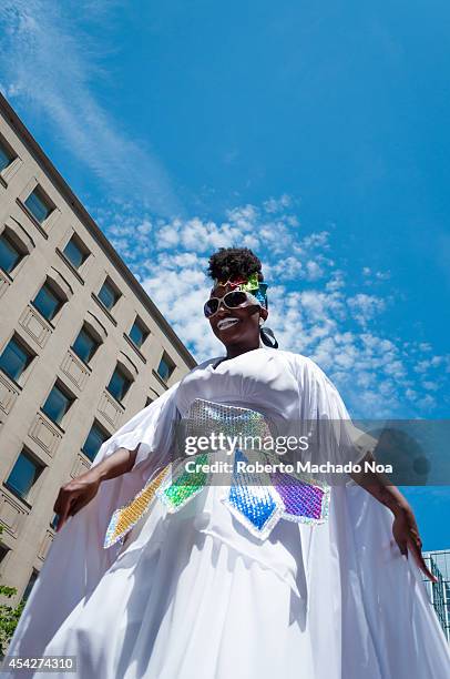 Person on stilts during Pride Parade the closing activity of the Toronto Pride Festival which celebrates the history, courage, diversity and future...