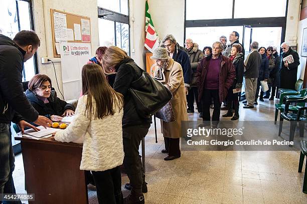 People queue to vote during the PD primary elections on December 8, 2013 in Rome, Italy. Italians are voting today to elect the new leader of the...