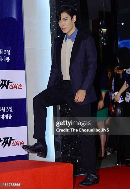 Of BigBang poses for photographs during the movie "Tazza: The High Rollers 2" VIP premiere at Geondae Lotte Cinema on August 25, 2014 in Seoul, South...